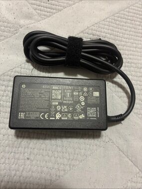 HP Black 65W Notebook Power Adapter with Integrated Cord